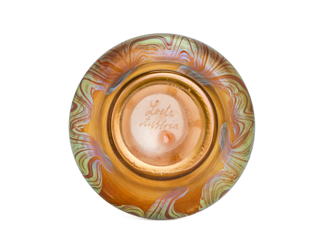 Art Nouveau vase by Johann Loetz Witwe, executed in Phänomen Genre 1/214, blown in orange glass with a richly iridescent surface featuring the characteristic flowing lines and delicate color reflections typical of the Phänomen Genre.